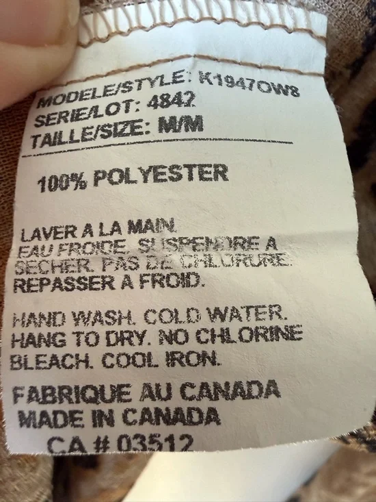 Sasson sheer Y2K animal print babydoll top with long flare sleeves lettuce hem. - Picture 6 of 6